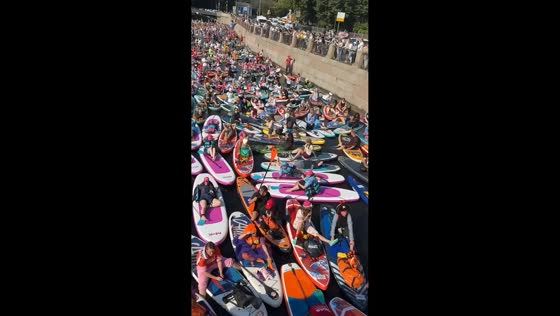 Thousands join colorful SUP festival on St. Petersburg canals in St. Petersburg, Russia