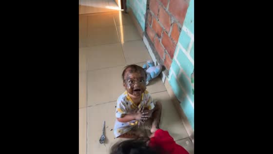 Toddler covered in cake cream delights in South Sumatra, Indonesia