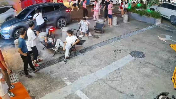 Scooter collides with parked car in Guangdong, China