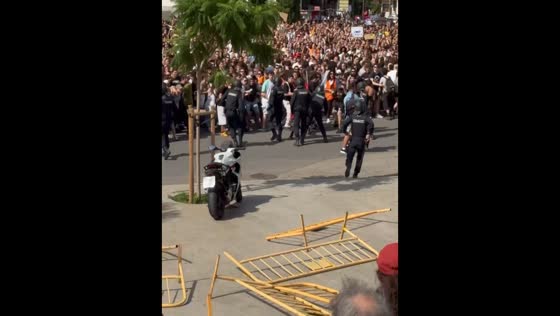 Riot police charge housing protesters during tense demonstration in Valencia, Spain