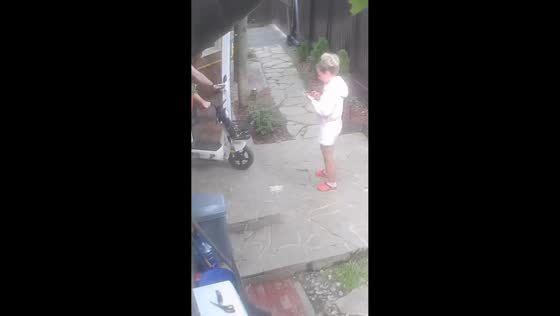 Woman struggles to control moving e-bike in Shchelkovo, Russia