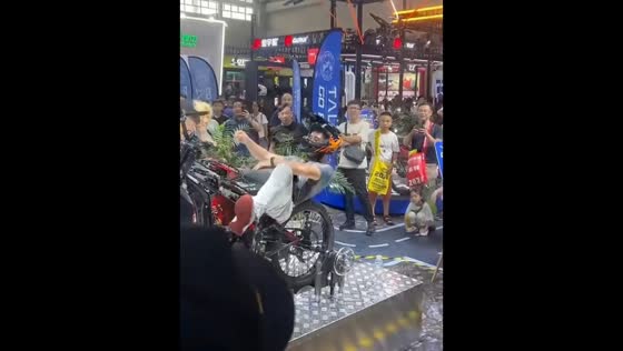Rider injured during wheelie performance at motorcycle expo in Chongqing, China
