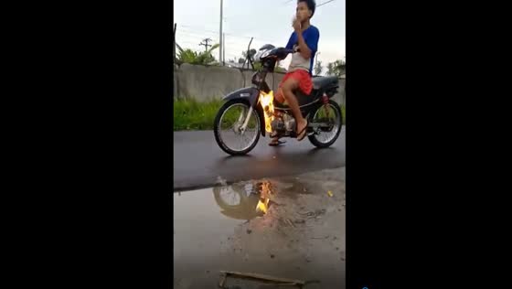 Brave biker's close call: dismantled motorbike catches fire during test run