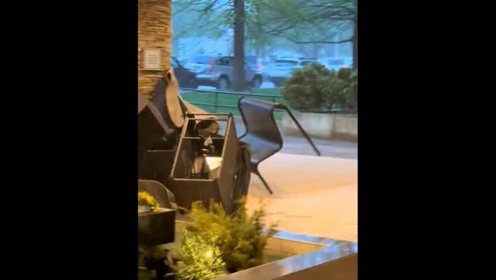 Strong winds blow furniture outside Pittsburgh hotel
