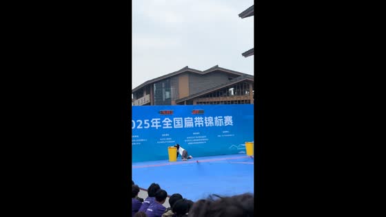 Female acrobat crosses garter in Sichuan, China