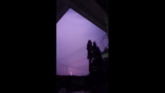 Lightning strikes near house during storm in Jiangsu, China