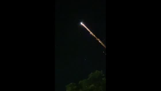 Glowing fireball in night sky identified as rocket debris in East Lampung, Indonesia