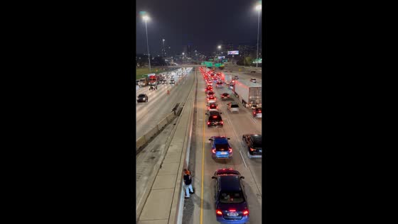Man relieves himself during traffic jam on expressway in Chicago, USA