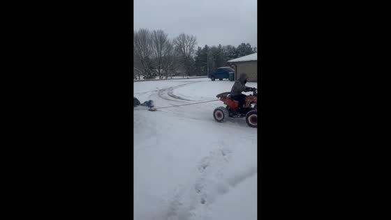 Snow-day ATV sledding fun in Mooresville, Indiana, USA