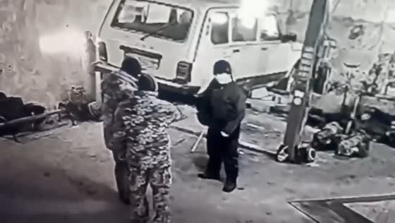 Clash at auto repair shop caught on security camera in Kherson, Ukraine