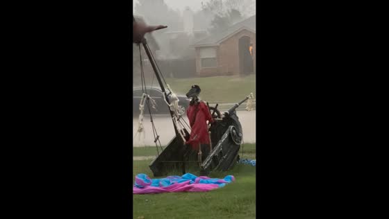 Pirate ship Halloween decorations sway in storm in Texas, USA