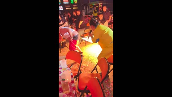 Fire performance leaves performer running to extinguish flames in Hebei, China