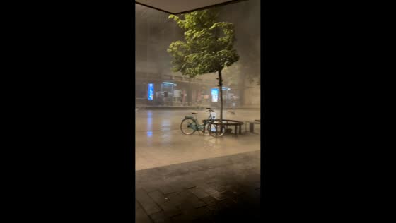 Strong winds and heavy rain batter street in Mannheim, Germany