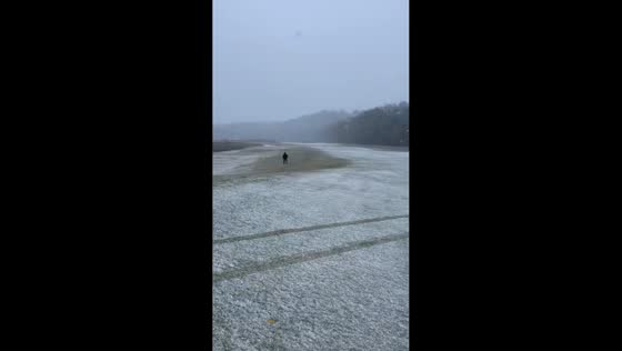 Brief morning snowfall covers golf course in Clarksville, USA