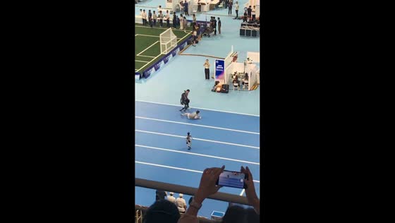 Robot collides with man during track run in Beijing, China