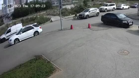 Miraculous escape: child unhurt as Lada Xray collides with bicycle and Subaru in Yekaterinburg