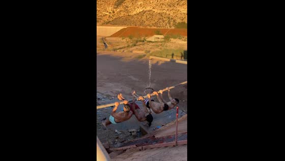 Four men attempt impromptu water pipe pull-up, hilarious fail ensues