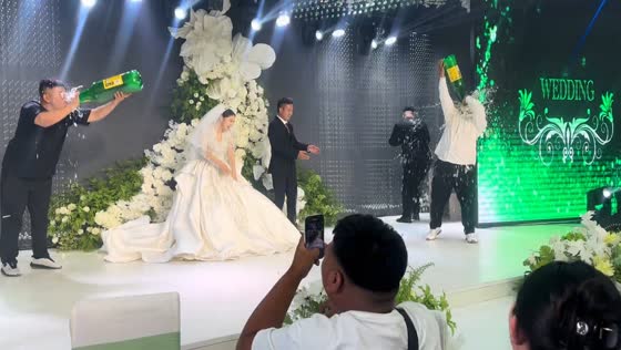 Best men soaked in beer during wedding game in Liaoning, China
