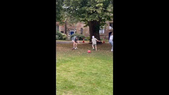 Dog joins tug of war game in Worcester, UK 