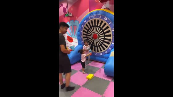 Father accidentally hits inflatable axe back at toddler in Tianjin, China