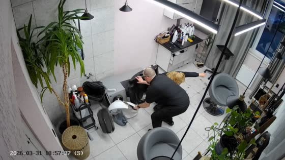 Client tips over salon chair at beauty studio in Lviv, Ukraine