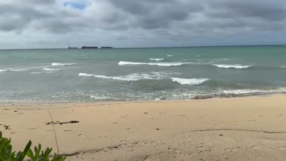 Overcast skies and choppy waves during Tropical Storm Imelda in New Providence, Bahamas