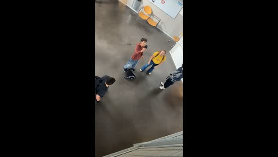 Students miss cellphone catch during failed toss between floors in Vitrolles, France