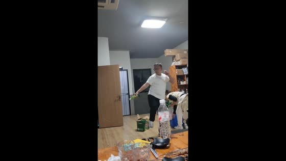 Man slips while trying to open a beer bottle in Shandong, China