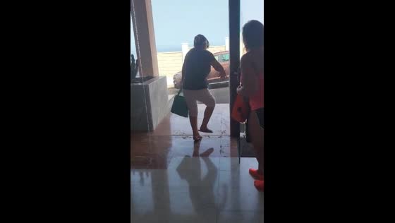73-year-old mother bumps into glass wall, sparks laughter