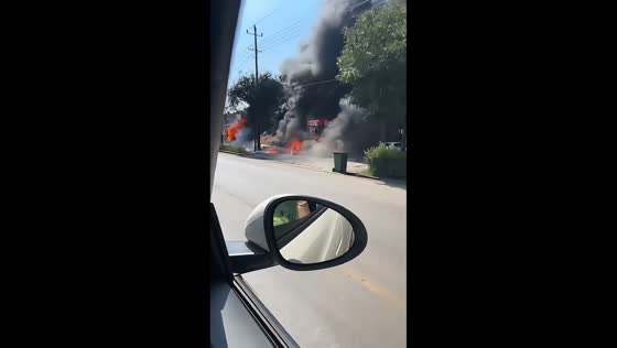 Oil tanker truck erupts in flames near roadside shops in Shanxi, China