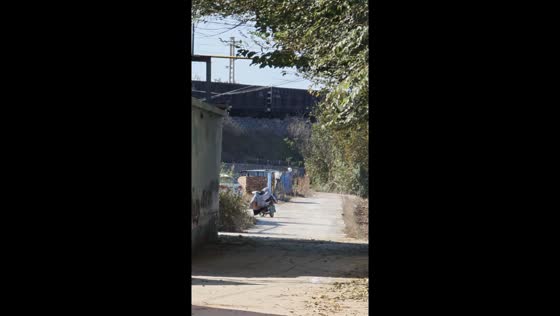 Electric train appears suspended on elevated track in Hebei, China