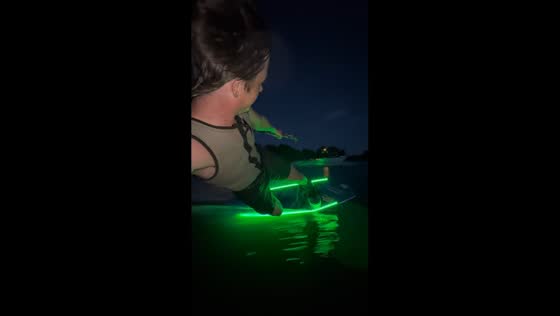 Glowing wakeboard lights up the night in Arkansas, USA