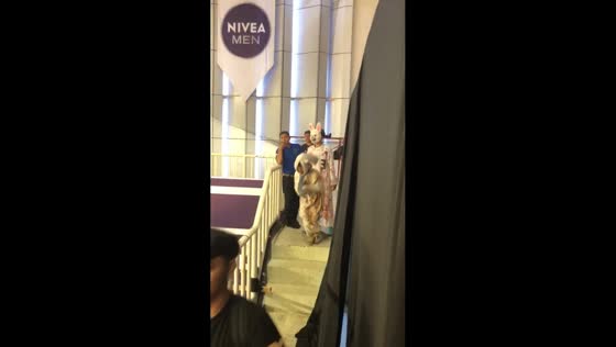 Man dressed as pocong falls and rolls while hopping in Jakarta, Indonesia