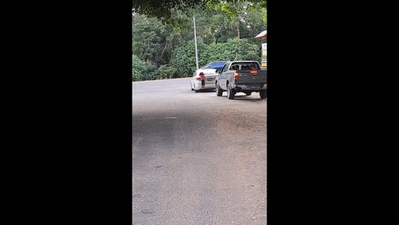 Doll hanging from car boot creates a funny scene in Tegucigalpa