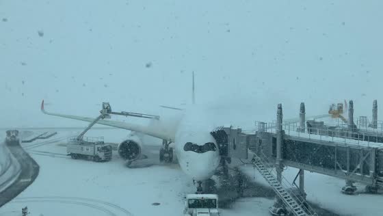 Severe snowfall blankets New Chitose Airport in Hokkaido, Japan