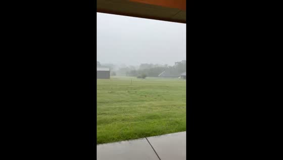 Steady downpour reduces visibility across Blanchard, Oklahoma, USA
