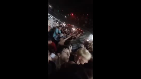 Stage dive attempt fails as audience moves away in Buenos Aires, Argentina