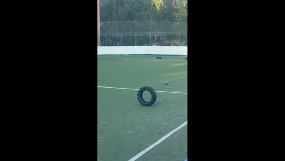 Boy trips after kicking tire on field in Surgut, Russia
