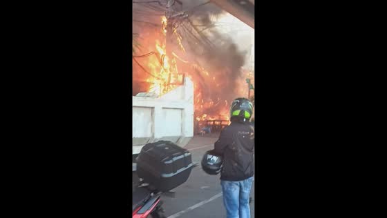 Firefighters battle intense blaze near Monumento Circle in Caloocan, Philippines