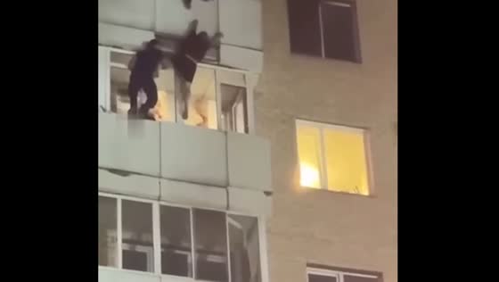 Firefighters rescue woman from burning apartment in Astana, Kazakhstan