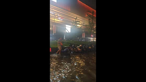 Flooded street leaves vehicles submerged in Shanghai, China