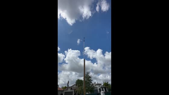 Anemometer spins in breezy weather at home weather station in Lake Worth Beach, Florida, USA