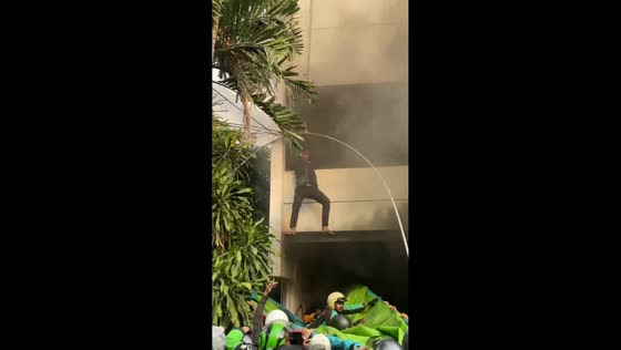 Fire rescue during mass rally in East Jakarta, Indonesia