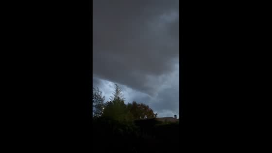 Funnel cloud forms beneath massive storm cell over Bordeaux, France