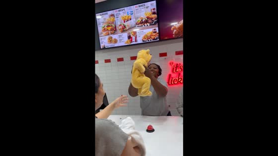 Fastfood staff delighted by baby in fuzzy yellow costume in Durban, South Africa