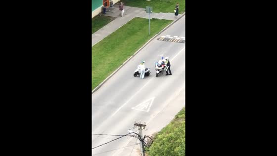 12-year-old girl on scooter leads police motorcycle chase in Tosno, Russia