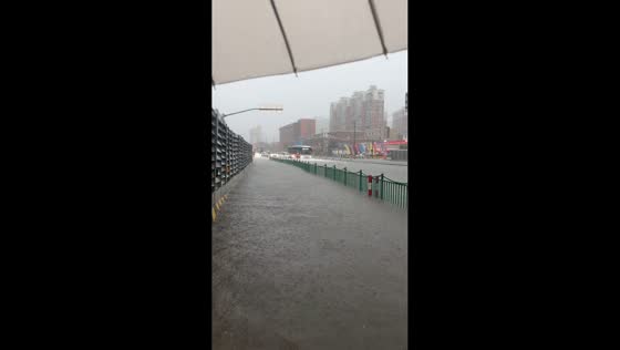 Flooded streets leave vehicles stranded in Shanghai, China