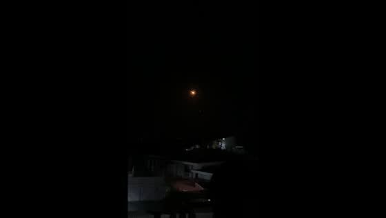 Rocket debris lights up night sky in Laoag City, Philippines