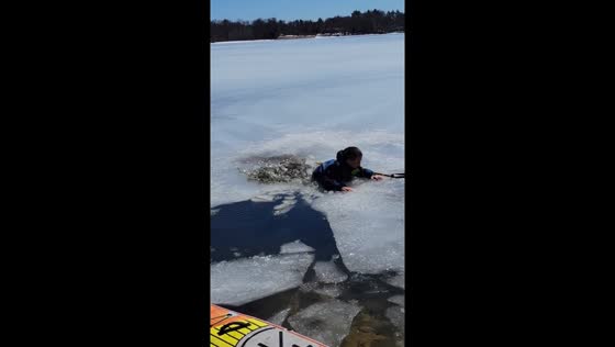 Boy's attempts to quickly get out after suddenly falling through the ice