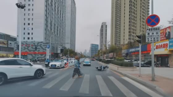 Motorcycle drifts and slides on the road in Fujian, China